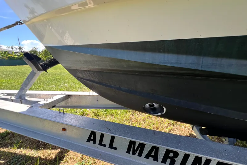 Slide: The Image of 2006 Grady-White Express 330 boat on trailer, close-up view of hull and trailer. - 66