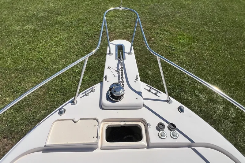 Slide: The Image of Bow of 2006 Grady-White Express 330 boat with anchor and railing. - 45