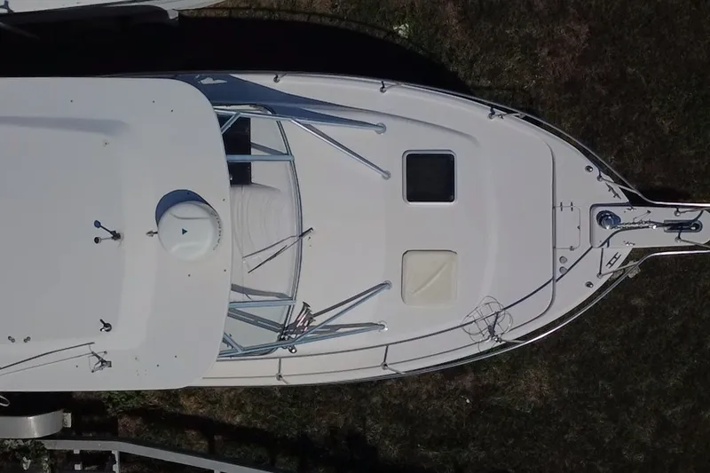 Slide: The Image of Aerial view of 2006 Grady-White Express 330 boat, showcasing deck layout. - 16