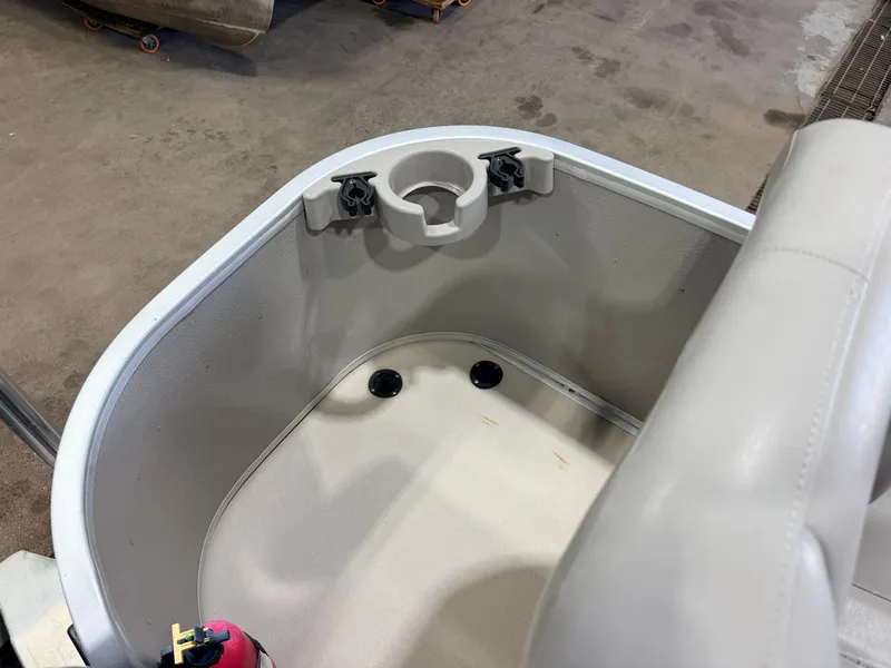 Slide: The Image of A boat with a cup holder and a cushioned seat in a corner. - 38