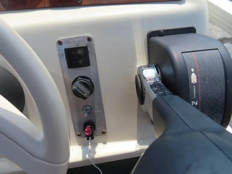 Slide: The Image of Close-up of a control panel with switches and a lever. - 17