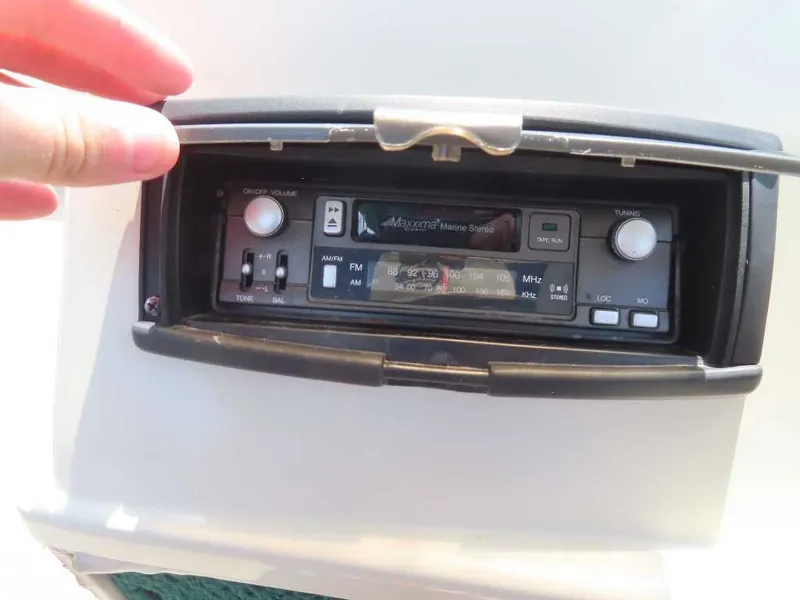 Slide: The Image of A marine stereo system in a 1999 Bennington Pontoon. - 15