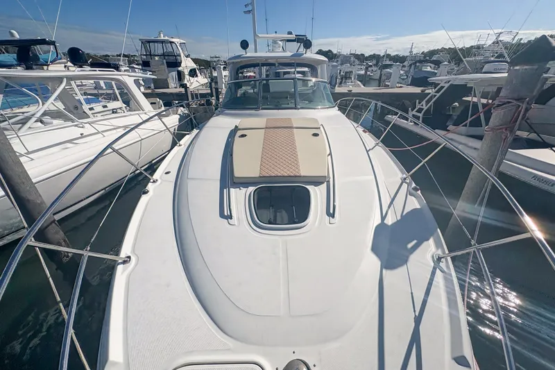Slide: The Image of 2008 Sea Ray 380 Sundancer yacht docked at marina, sunny day. - 27