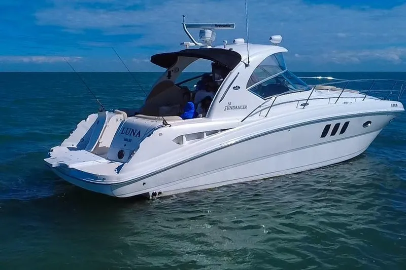 Slide: The Image of 2008 Sea Ray 380 Sundancer yacht cruising on open water. - 85