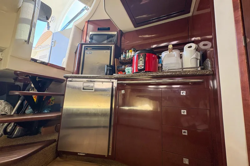 Slide: The Image of Luxurious 2008 Sea Ray 380 Sundancer yacht interior kitchen with modern appliances. - 52
