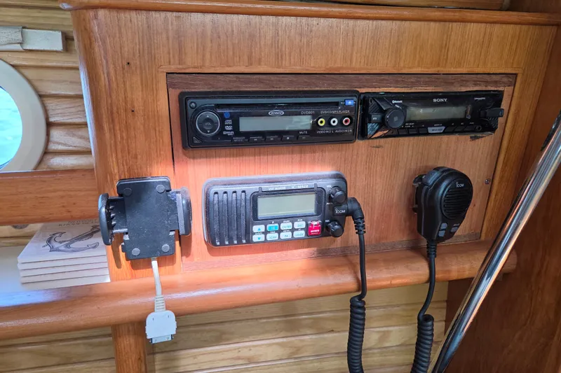 Slide: The Image of Control panel of a 2002 Catalina 390 sailboat with radio and audio equipment. - 40