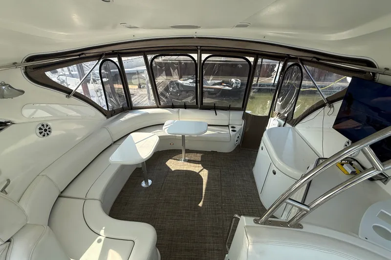 Slide: The Image of Luxurious interior of 2008 Cruisers Yachts 520 Express with elegant seating and modern amenities. - 13