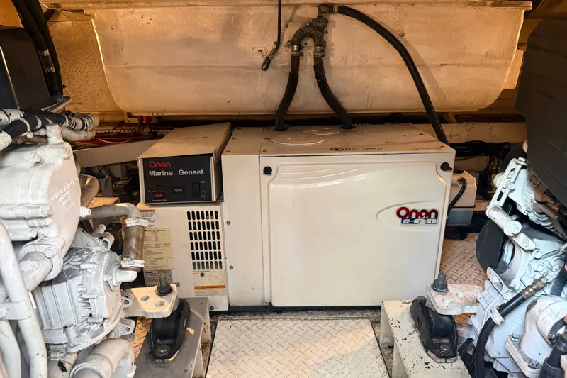 Slide: The Image of Engine room of 2008 Cruisers Yachts 520 Express with Onan marine generator. - 24