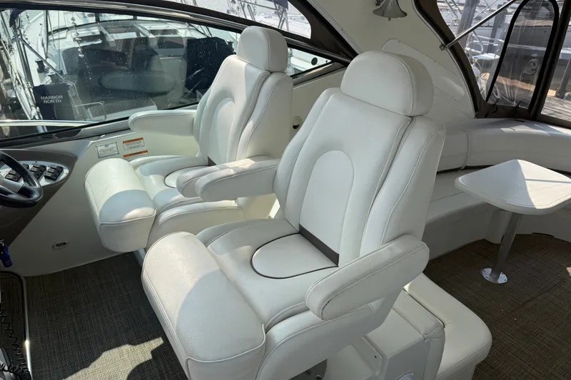 Slide: The Image of Luxurious interior of 2008 Cruisers Yachts 520 Express with plush white seating. - 31