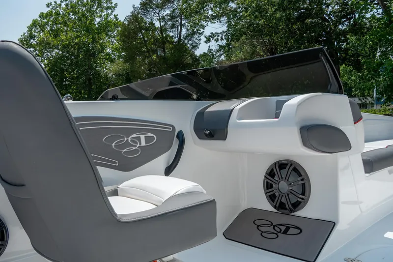 Slide: The Image of 2024 Tahoe T21 boat interior with sleek seating and modern design elements. - 9