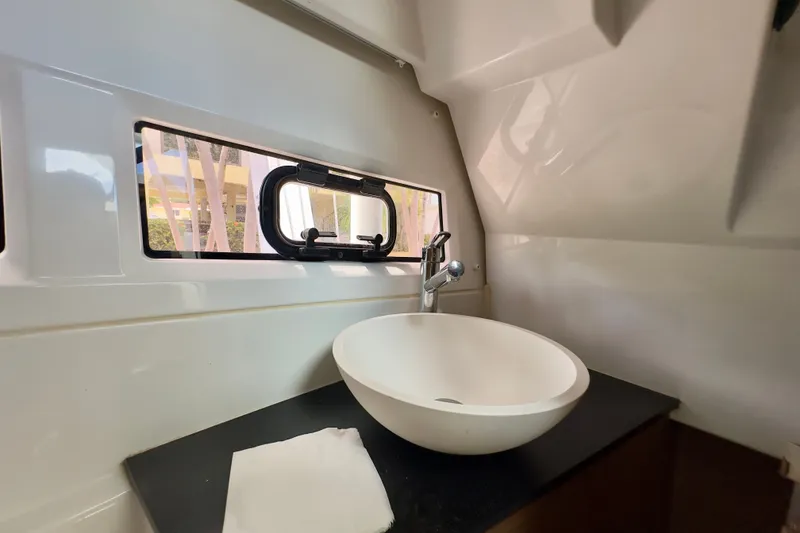 Slide: The Image of Modern bathroom sink in 2018 Jeanneau NC 895 boat interior. - 35