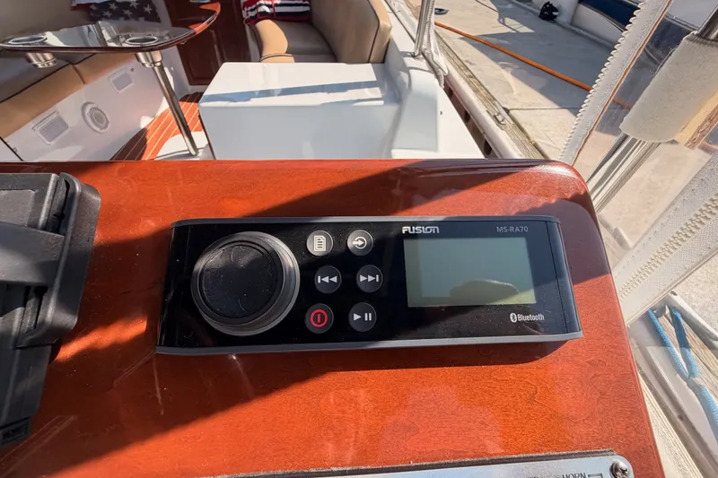 Slide: The Image of Fusion MS-RA70 Bluetooth stereo on 2018 Duffy Cuddy Cabin 22 boat dashboard. - 29