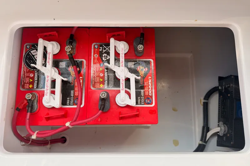 Slide: The Image of Battery compartment of a 2018 Duffy Cuddy Cabin 22 with dual deep cycle batteries. - 42