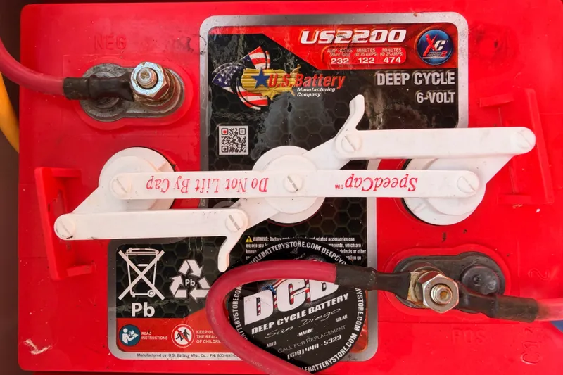 Slide: The Image of Deep cycle 6-volt battery in a 2018 Duffy Cuddy Cabin 22 boat. - 39