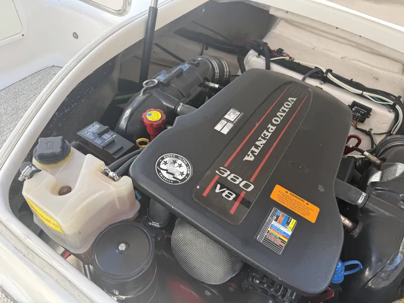 Slide: The Image of A Volvo Penta 380 V8 engine in a 2013 Chaparral 264 Sunesta boat. - 26