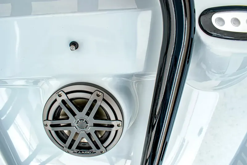 Slide: The Image of Close-up of a speaker on a 2027 Sea Hunt Ultra 219 boat. - 14