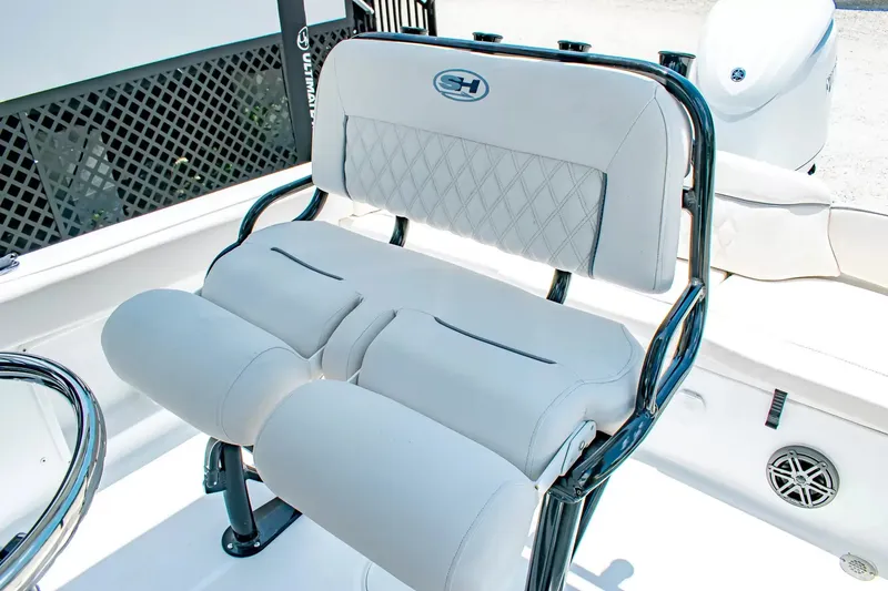 Slide: The Image of The 2027 Sea Hunt Ultra 219 features a cushioned bench seat with quilted pattern and black frame. - 18
