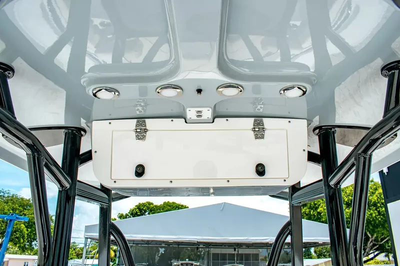 Slide: The Image of The image shows the roof of a Sea Hunt Ultra 219 boat with built-in lights. - 15