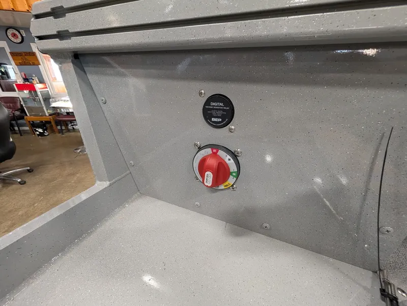 Slide: The Image of Close-up of a switch and gauge on a boat panel. - 15