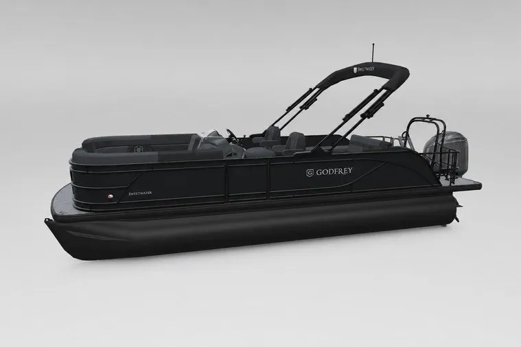 Slide: The Image of 2027 Godfrey Sweetwater 22' Tritoon boat, sleek black design, single flip lounge seating. - 94