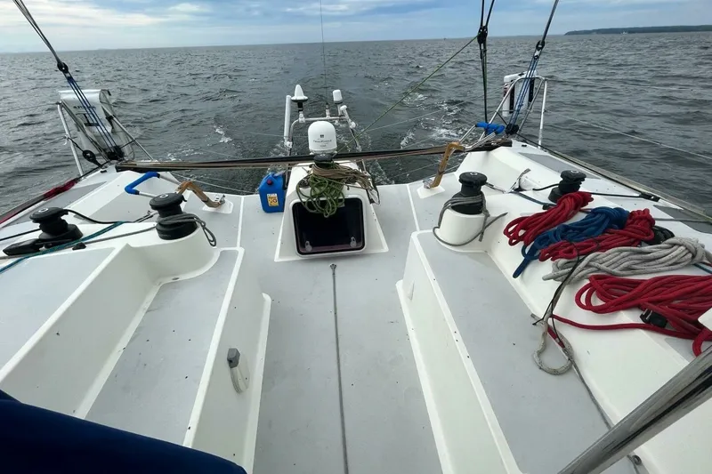 Slide: The Image of Cockpit view of 2007 Class 40 Akilaria MK1 sailboat on open water. - 24
