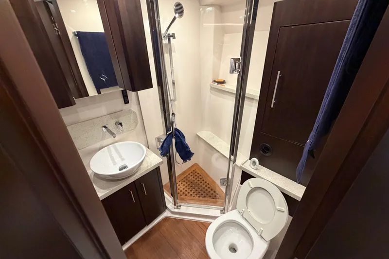 Slide: The Image of Luxurious bathroom in 2018 Regal 53 Sport Coupe yacht with modern fixtures. - 124