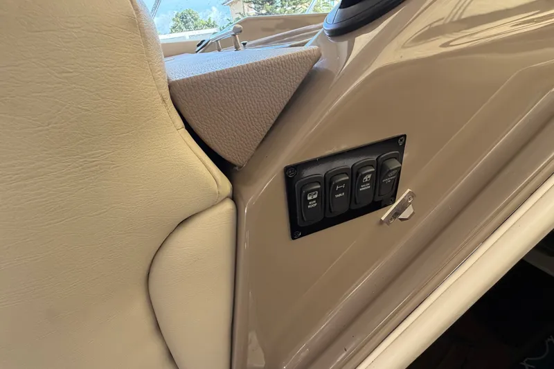 Slide: The Image of Control panel on 2018 Regal 53 Sport Coupe boat interior. - 81
