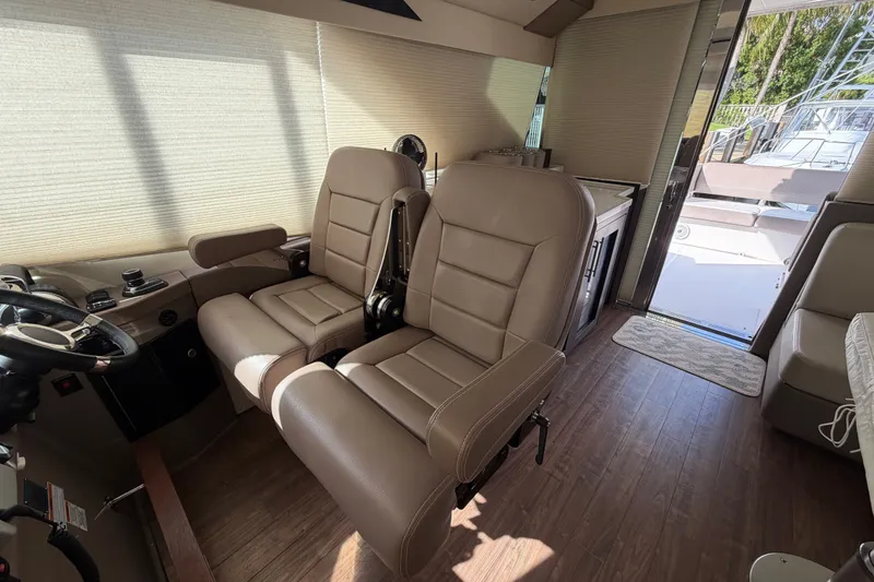 Slide: The Image of Interior of 2018 Regal 53 Sport Coupe with leather seats and modern design. - 83