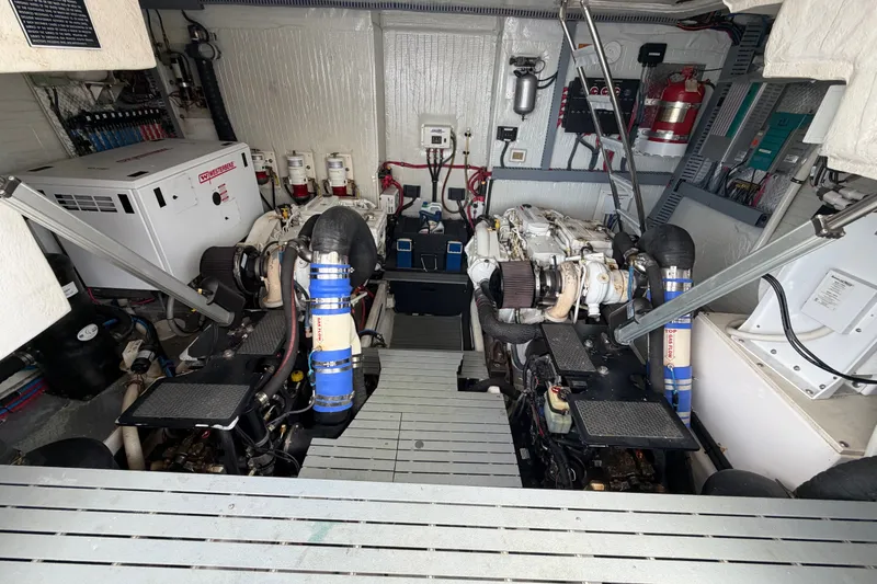 Slide: The Image of Engine room of a 2018 Regal 53 Sport Coupe with dual engines and equipment. - 50