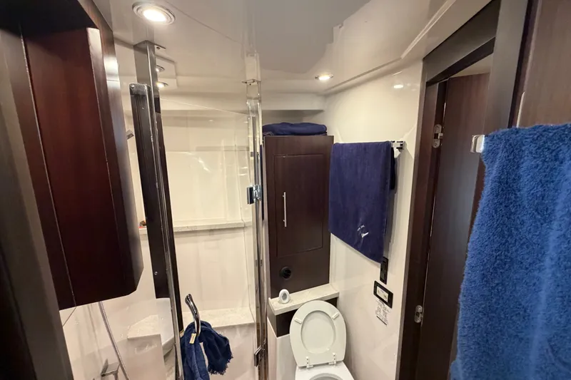 Slide: The Image of Luxurious bathroom interior of 2018 Regal 53 Sport Coupe yacht with modern amenities. - 114