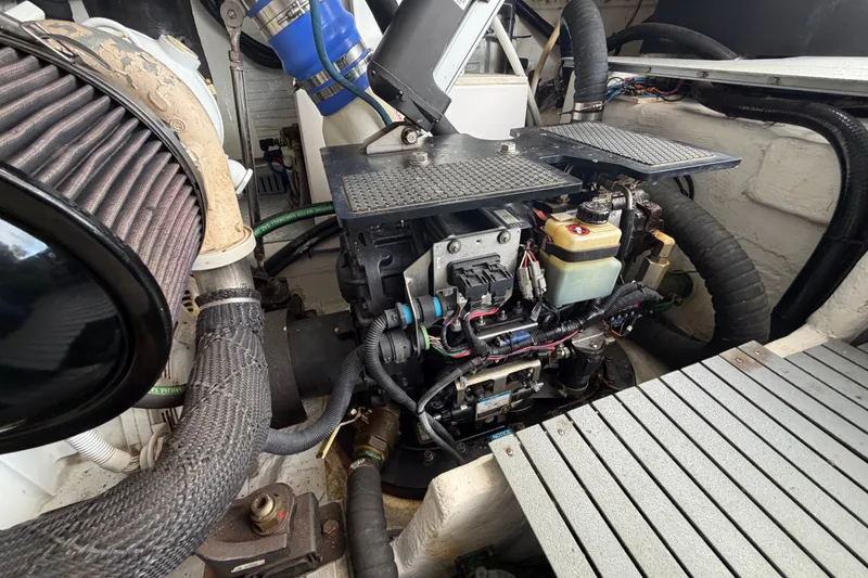 Slide: The Image of Engine compartment of a 2018 Regal 53 Sport Coupe, showcasing detailed mechanical components. - 62