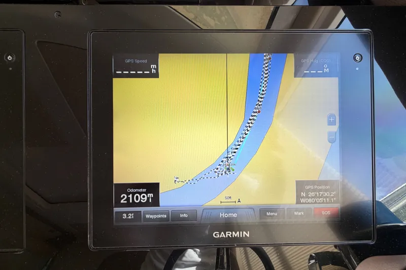 Slide: The Image of Garmin GPS display on 2018 Regal 53 Sport Coupe, showing navigation route and odometer reading. - 79