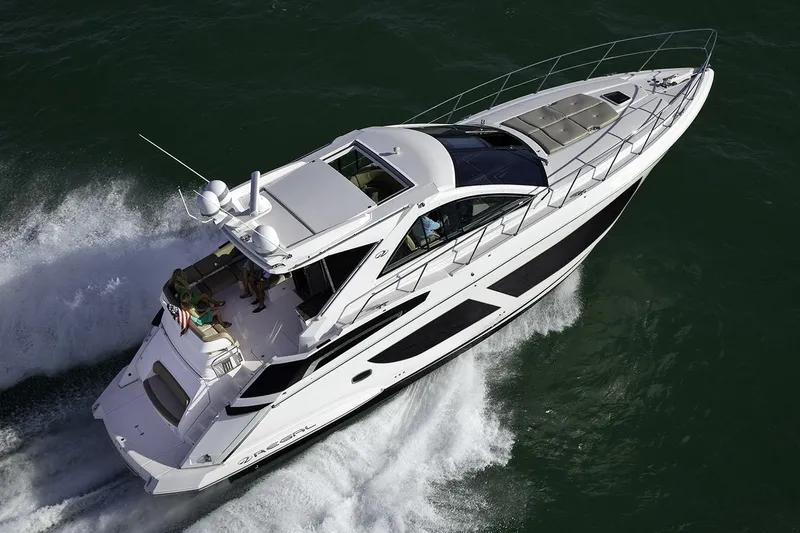 Slide: The Image of Manufacturer Provided Image: 2018 Regal 53 Sport Coupe cruising on water, aerial view. - 2