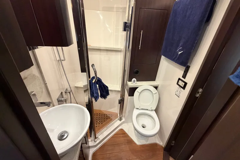 Slide: The Image of Luxurious bathroom in 2018 Regal 53 Sport Coupe yacht with modern fixtures. - 115