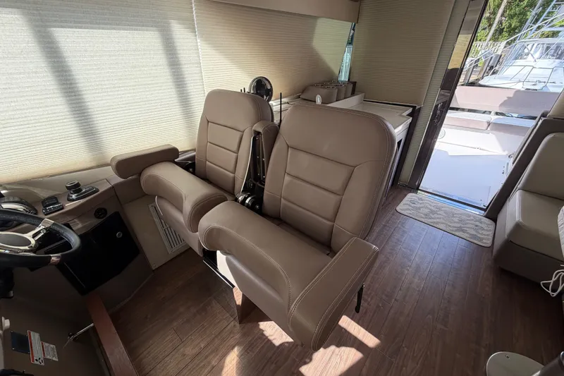 Slide: The Image of Interior of 2018 Regal 53 Sport Coupe with luxurious seating and modern design. - 84