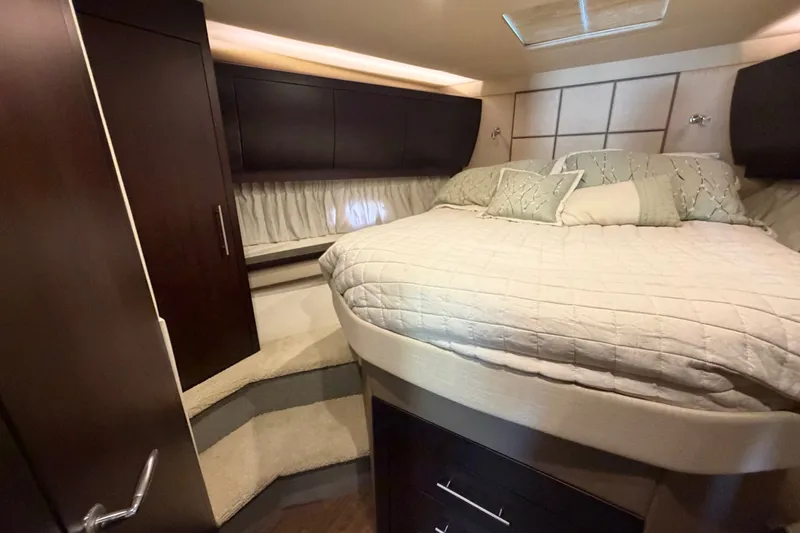 Slide: The Image of Luxurious bedroom interior of 2018 Regal 53 Sport Coupe yacht with elegant bedding. - 118