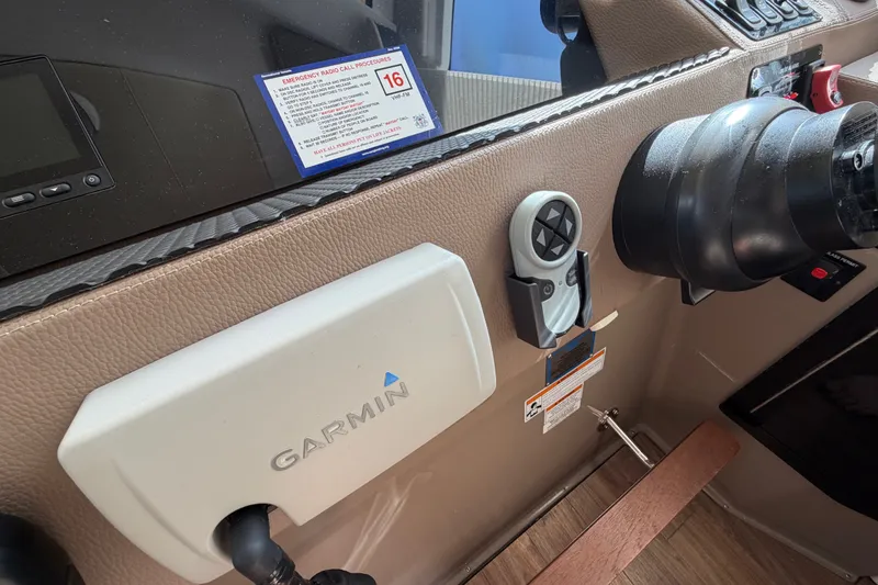 Slide: The Image of Garmin navigation system in 2018 Regal 53 Sport Coupe cockpit. - 76