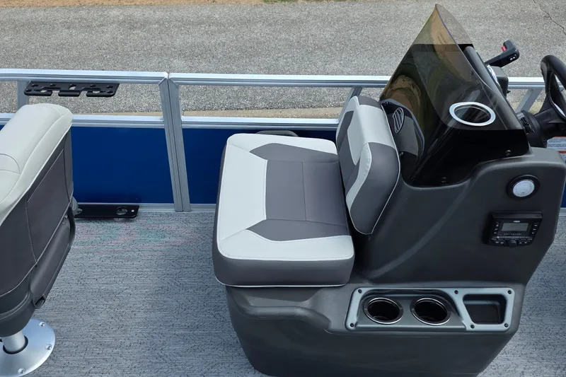 Slide: The Image of 2027 Sun Tracker Bass Buggy 16 XL Select boat interior with seating and console. - 15