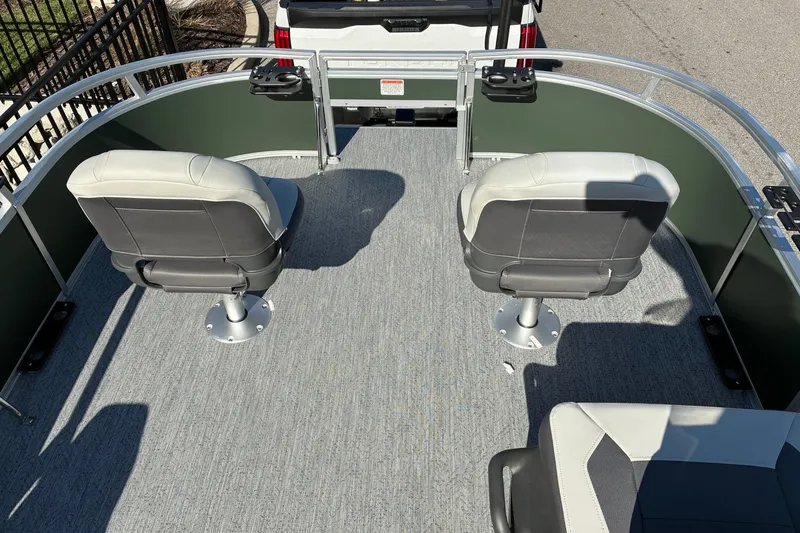 Slide: The Image of 2027 Sun Tracker Bass Buggy 16 XL Select pontoon boat with two swivel seats. - 15