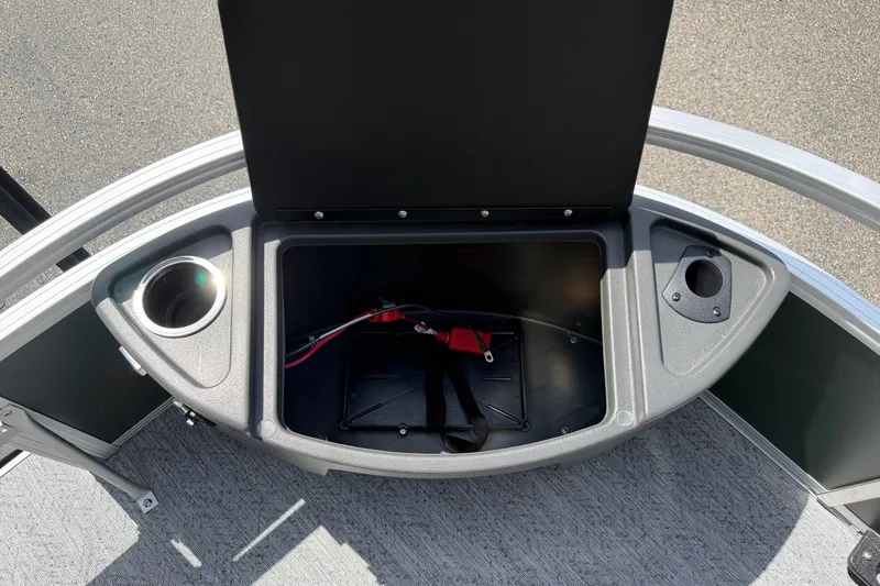 Slide: The Image of Open storage compartment on 2027 Sun Tracker Bass Buggy 18 DLX pontoon boat. - 17