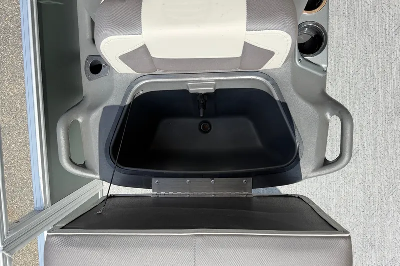Slide: The Image of Sun Tracker Bass Buggy 18 DLX 2027 boat seat with storage compartment open. - 19