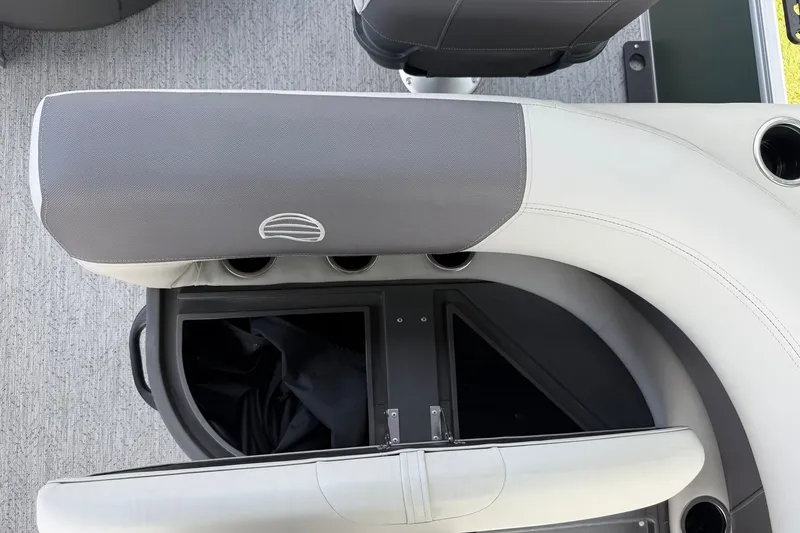 Slide: The Image of Sun Tracker Bass Buggy 18 DLX 2027 boat seating with storage compartment and cup holders. - 22