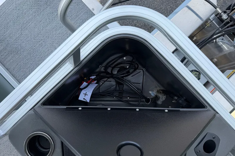 Slide: The Image of Storage compartment of 2027 Sun Tracker Bass Buggy 18 DLX pontoon boat. - 25