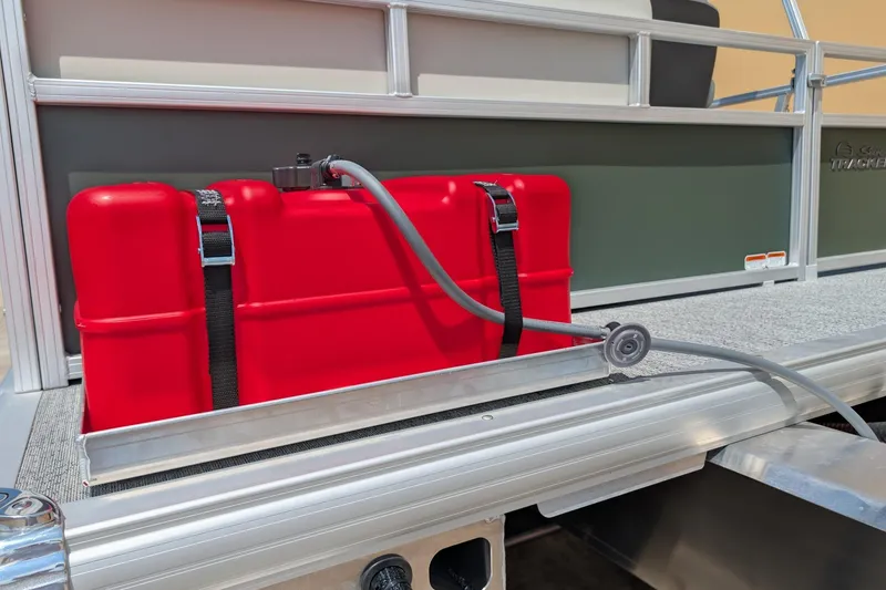 Slide: The Image of Red fuel tank on 2027 Sun Tracker Bass Buggy 16 XL Select pontoon boat. - 13