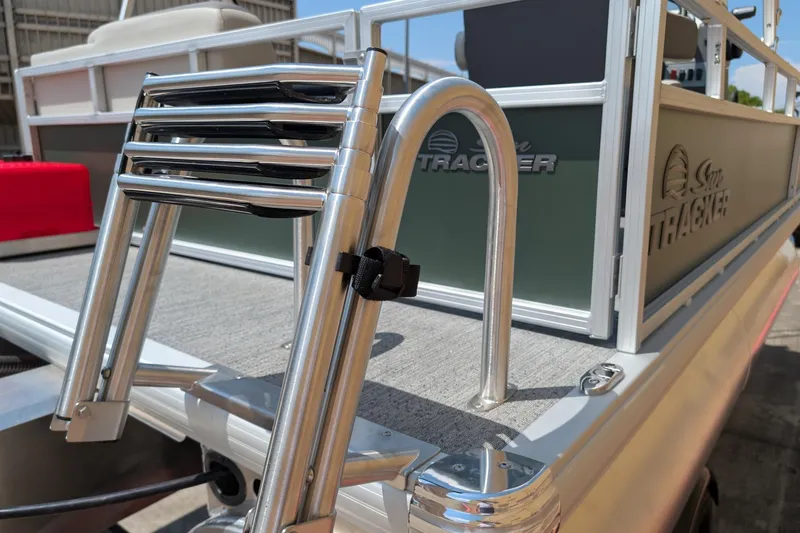 Slide: The Image of 2027 Sun Tracker Bass Buggy 16 XL Select pontoon boat with ladder detail. - 14