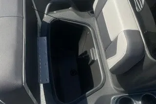 Slide: The Image of Interior view of 2027 Sun Tracker Bass Buggy 18 DLX boat seating and storage area. - 14