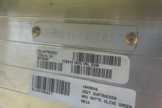 Slide: The Image of 2027 Sun Tracker Bass Buggy 18 DLX identification plate with serial numbers and barcodes. - 16