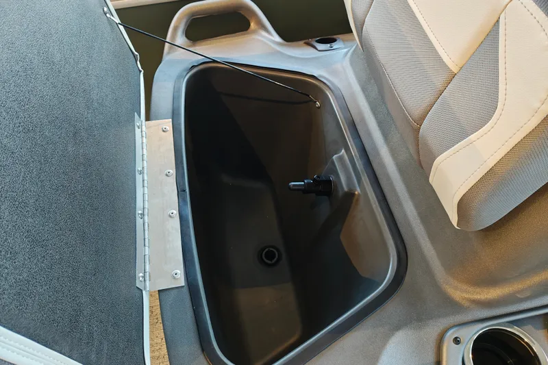Slide: The Image of 2027 Sun Tracker Bass Buggy 16 XL Select boat seat with storage compartment. - 17
