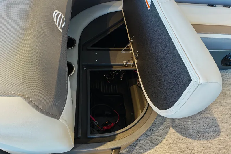 Slide: The Image of Open storage compartment in 2027 Sun Tracker Bass Buggy 16 XL Select boat. - 33