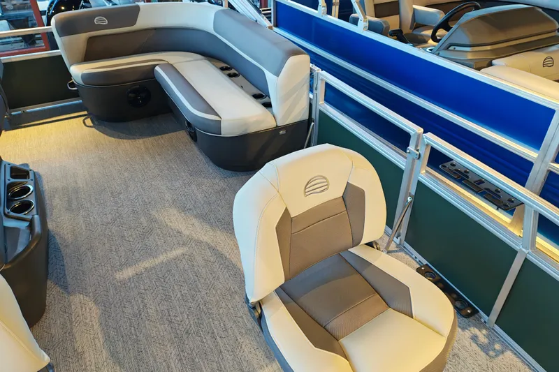 Slide: The Image of 2027 Sun Tracker Bass Buggy 16 XL Select interior with comfortable seating and modern design. - 26